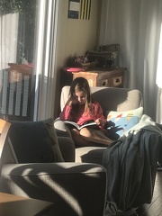 Greta Reading at the Lake House